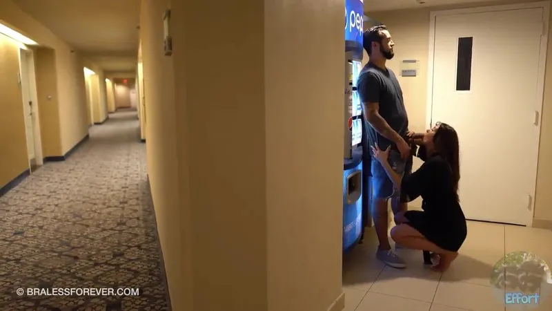 Gorgeous Babe gives a public blowjob video in a hotel hallway