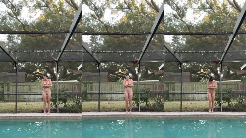 BerigaGalaxy shows off her curvy body by the outdoor pool with long dark hair and a smooth pussy in natural lighting video