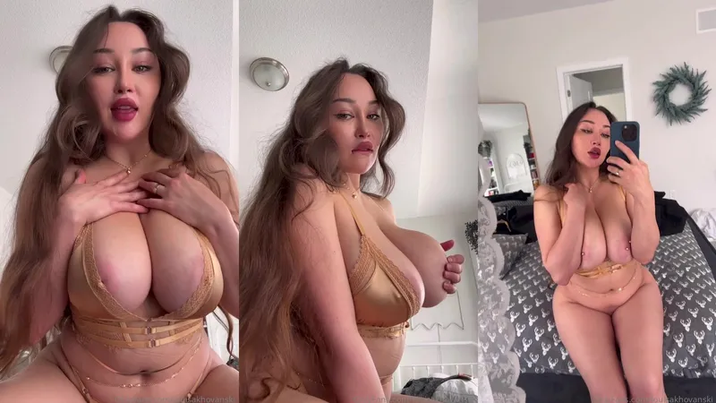 Louisa Khovanski Stuns In Gold Lingerie Showing Off Her Curvy Goddess Body In Bedroom Tease Video