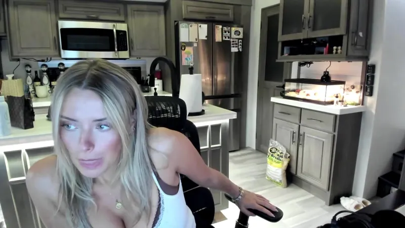 Corinna Kopf Showing off her boobs during steamy live stream in the kitchen