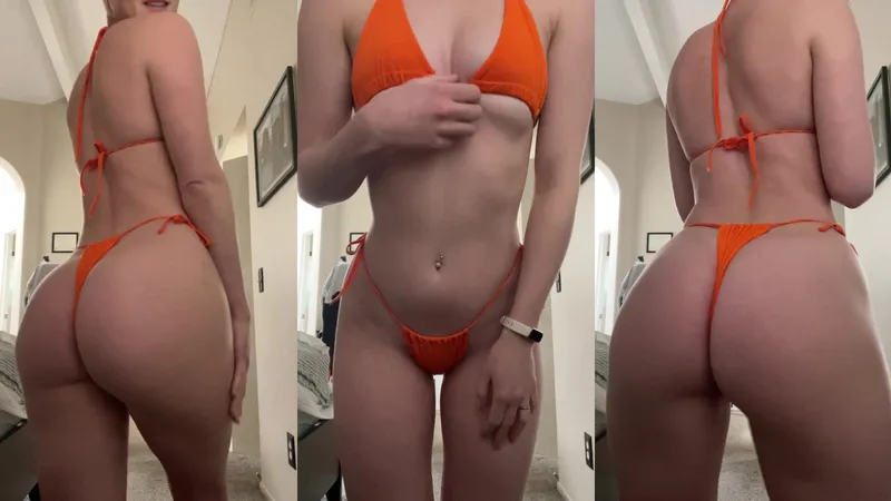 STPeach Shows Her Thick Thighs In An Orange Bikini Video