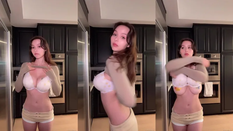 Sophie Mudd Teasing In Front Of The Mirror While Stripping Slowly
