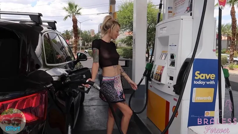 BralessForever A Cute Girl Pumping Gas In Public Wearing A High Cut Skirt And See Through Top