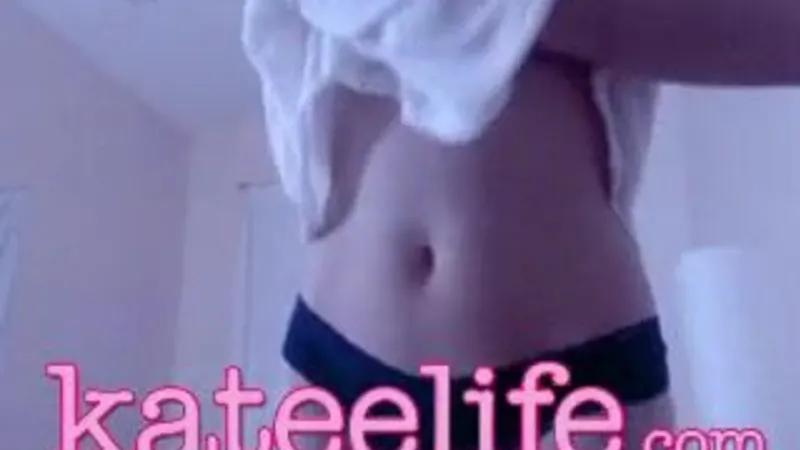 Katee Owen Strips And Shows Off Her Curves In A White Top & Tight Panty