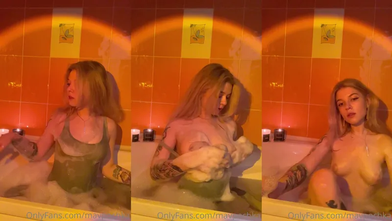 OnlyFans Blonde Mavpochka Soaping Her Curvy Body in a Bubble Bath Video.