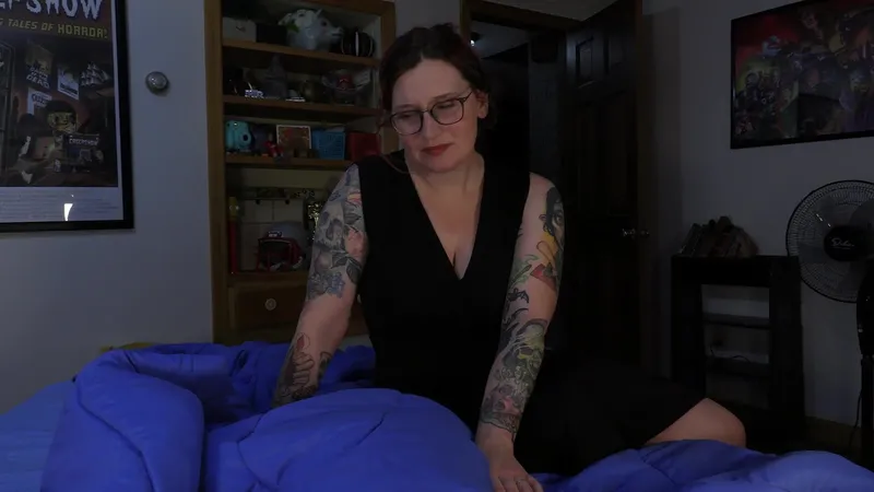 Bettie Bondage strips naked in her room while teasing you in this seductive video