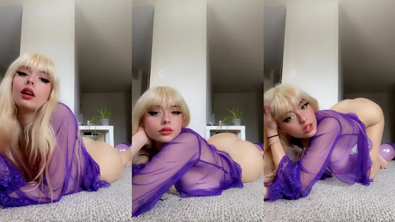 Blonde OnlyFans Babe Juli4 Poses In Purple Lingerie Showing Off Her Curves In Sensual Video
