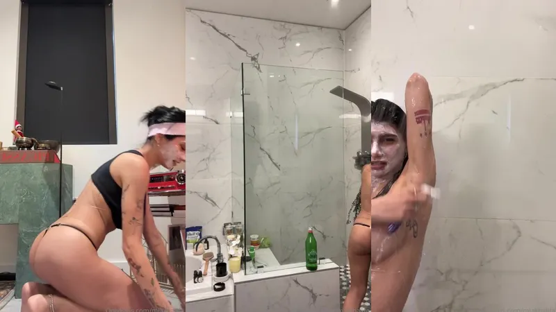 MiaKhalifa takes a steamy shower teasing her big boobs and wet body in this solo OnlyFans video