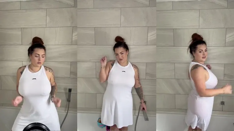 NataliaReynoldsVip Takes a Steamy Shower in Tight White Dress in this Behind the Scenes OnlyFans Video