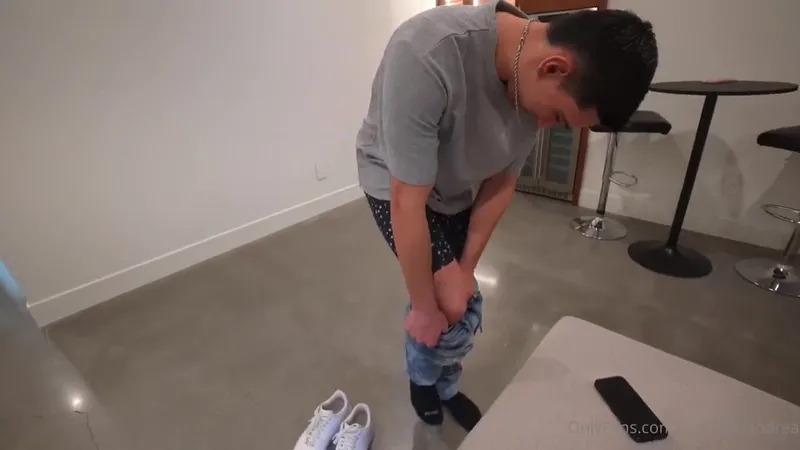 Isaacandandrea tease with handjobs and erections in casual outfits in this OnlyFans video