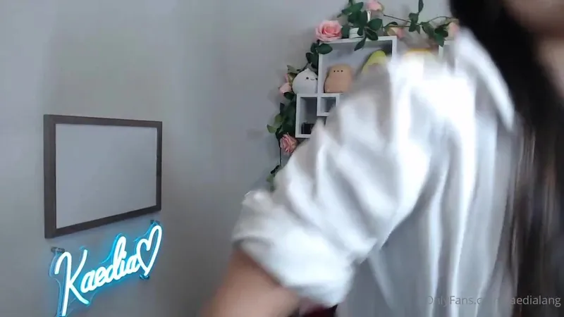 KaediaLang Schoolgirl Tease Strips in Bed for OnlyFans Video