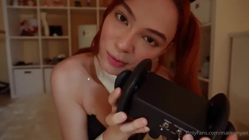 MaimyNyan ASMR bunny blowjob video in a Schoolgirl outfit with fishnet stockings and a tight ass on OnlyFans