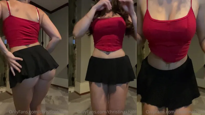 OnlyFans Christina Khalil Shows Off Her Curvy Goddess Body in a Red Crop Top and Tiny Black Skirt