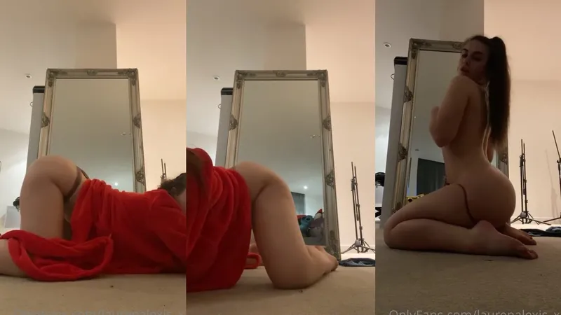 Lauren Alexis rubs her pussy in front of the mirror in this OnlyFans video.