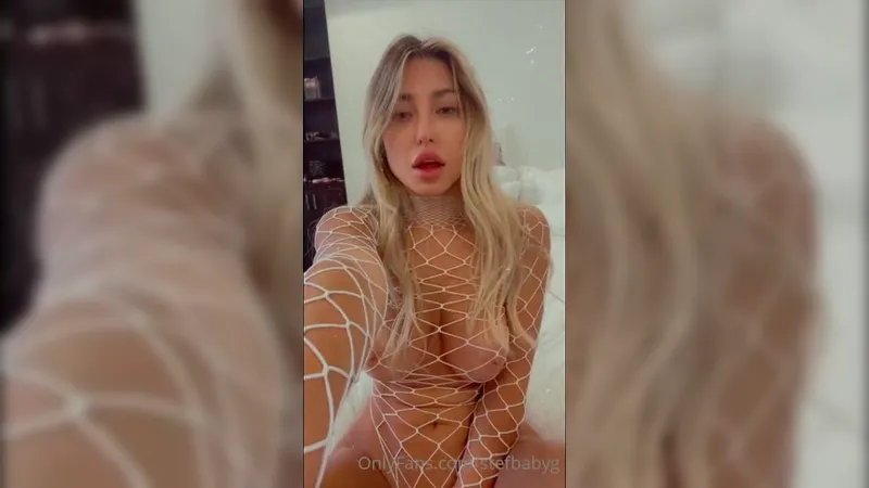 Stefbabyg in Nude Fishnet Teasing Her Tight Ass and Big Boobs in Seductive Video