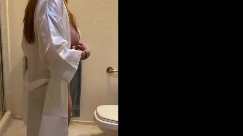 Christina Khalil Teases in Wet Slingkini Shower Video