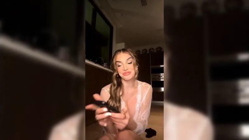 Lyna Perez Teases with Cucumber Blowjob in Fishnets for OnlyFans Video