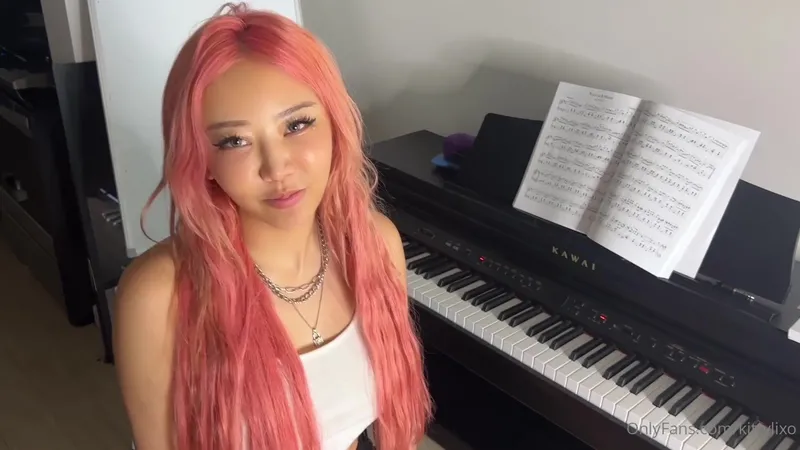 Kittylixo Teases Her Asian Pussy In Solo Pleasure Video