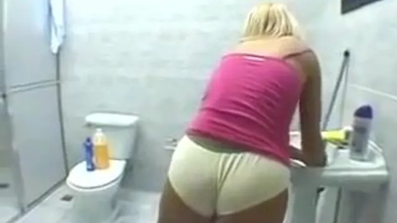 Brunette Babe Caught Scrubbing The Bathroom In Sexy Video