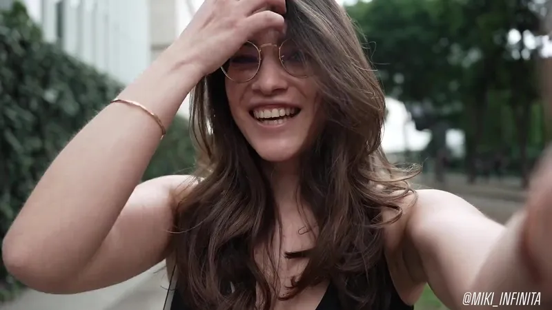 Miki Infinita Teases Her Tight Body in Public Changing Room Video