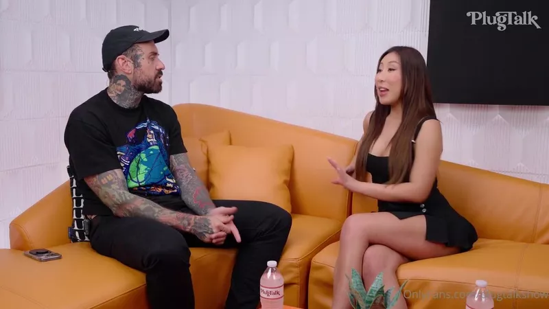 Nicole Doshi Teases With A Steamy Fuck On The Orange Couch With Adam In New PlugTalk Video