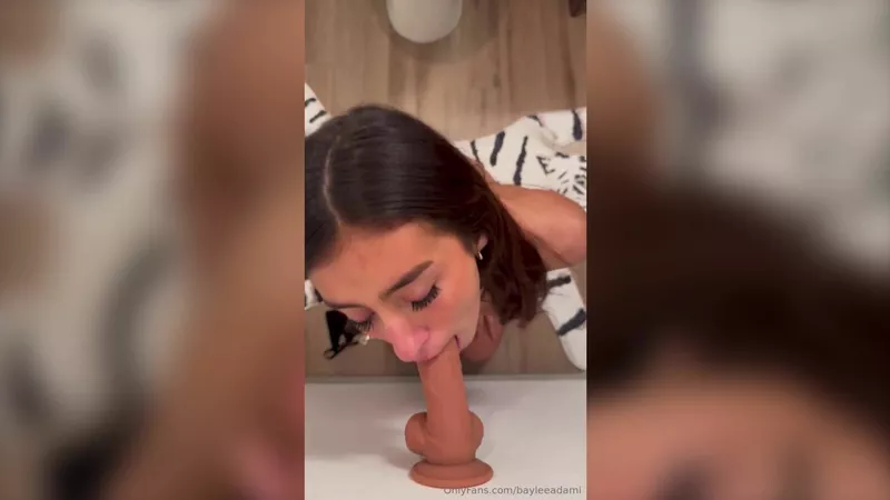 Baylee Adami Teases with Intense Dildo Deepthroat Action in Leaked Video
