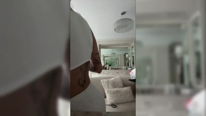 Bhad Bhabie Teases in a Tight Bikini and White Outfit in Seductive Video