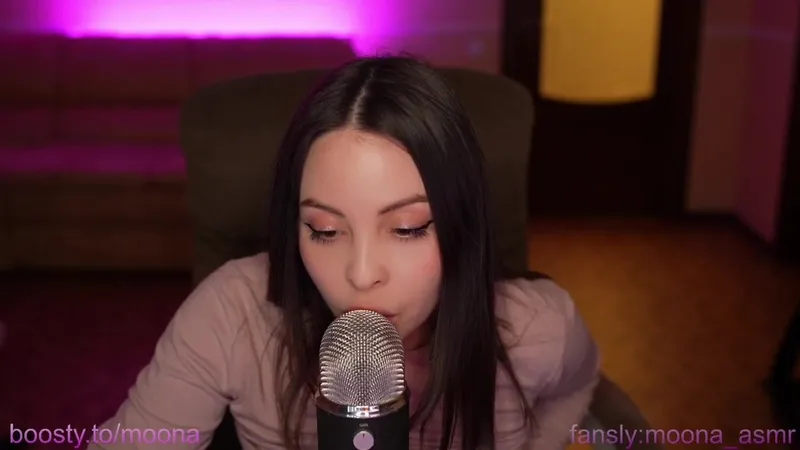 Moona__asmr Fansly star performs ASMR with microphone and playing tits.