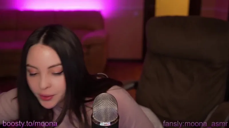 Moona__asmr Fansly star performs ASMR with microphone and playing tits.