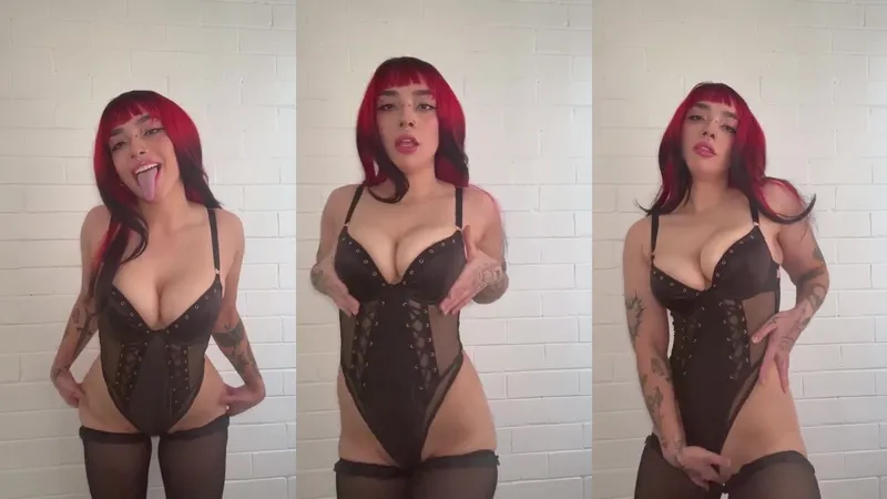 Bambi Tube Seductive Redhead Performs A Long Tongue Tease