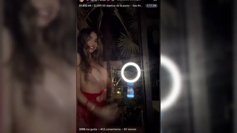 Lyna Perez Exposes Her Bare Breasts From A Balcony