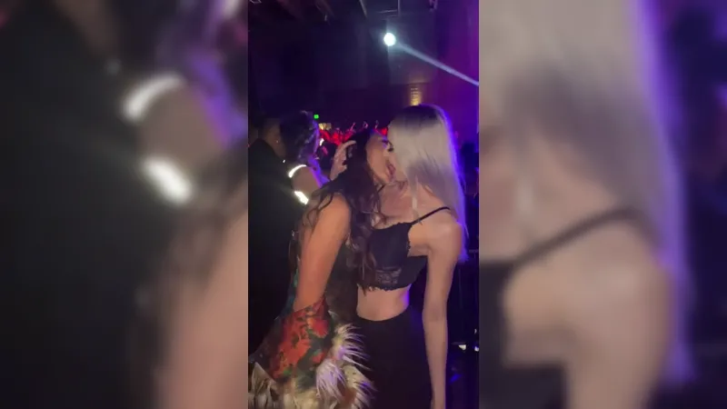 Hot girls sucking boobs at a concert