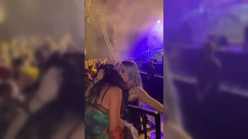 Hot girls sucking boobs at a concert