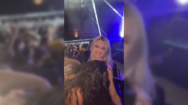 Hot girls sucking boobs at a concert